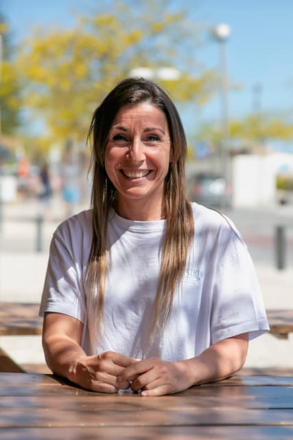 The owner of Rocha Beach House, smiling warmly.