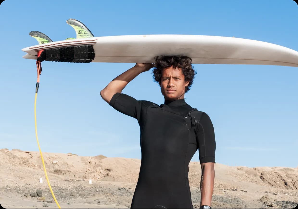 A male surfer, surfing. Almerrick surfboards, Torq surfboards